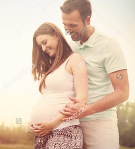 stock-photo-portrait-of-lovely-future-parents-during-sunset-201672545